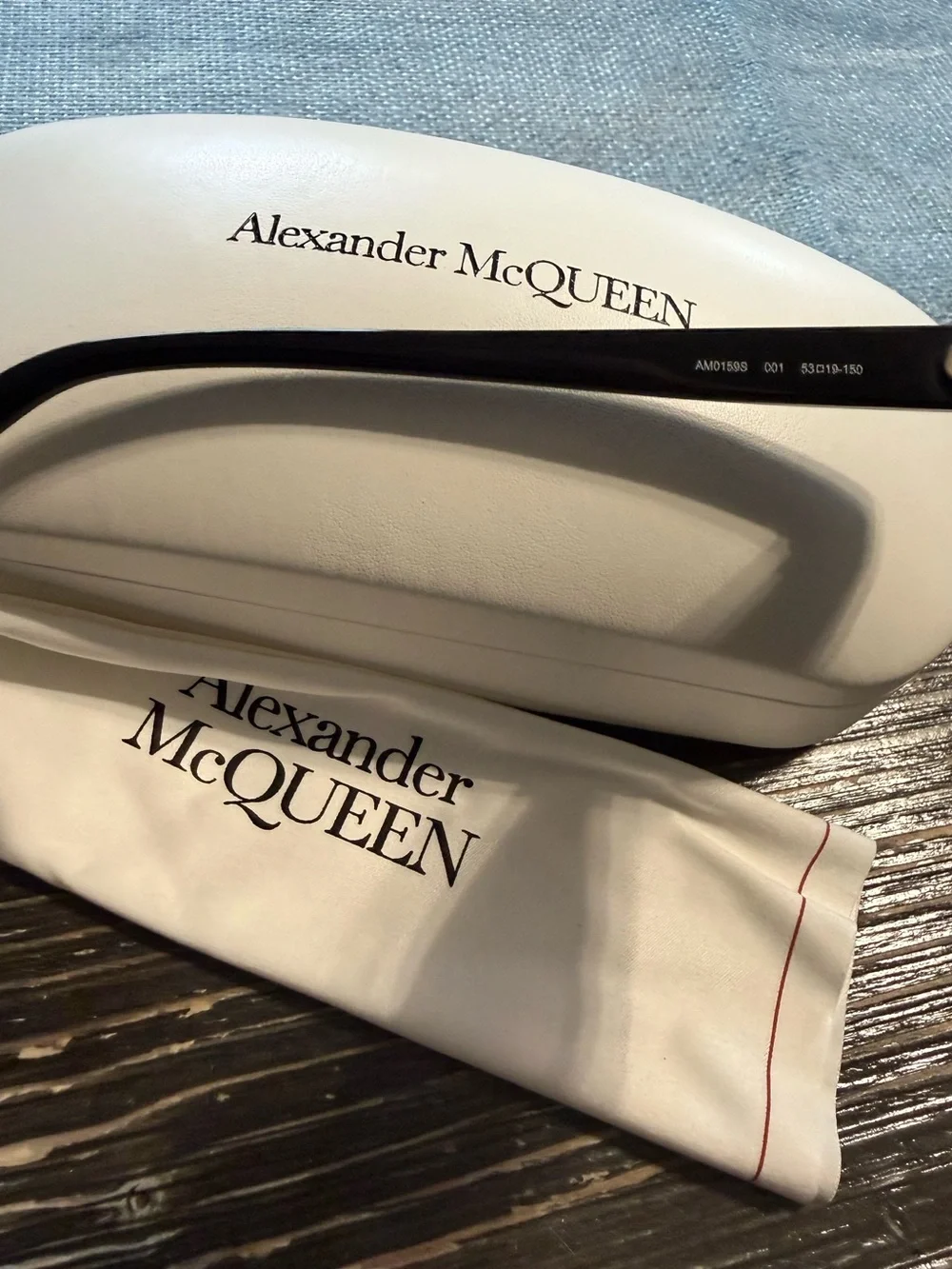 Alexander McQueen Black Cat-Eye Sunglasses with Gold Skull Detail
